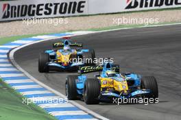 30.07.2006 Hockenheim, Germany,  Giancarlo Fisichella (ITA), Renault F1 Team, R26 and Fernando Alonso (ESP), Renault F1 Team, R26 - Formula 1 World Championship, Rd 12, German Grand Prix, Sunday Race