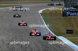 30.07.2006 Hockenheim, Germany,  Start of the race with Kimi Raikkonen (FIN), Team West McLaren Mercedes MP4-21, leading - Formula 1 World Championship, Rd 12, German Grand Prix, Sunday Race