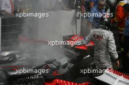 30.07.2006 Hockenheim, Germany,  Kimi Raikkonen (FIN), Räikkönen, McLaren Mercedes in park ferme after his car had a small fire - Formula 1 World Championship, Rd 12, German Grand Prix, Sunday Race