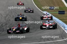 30.07.2006 Hockenheim, Germany,  Vitantonio Liuzzi (ITA), Scuderia Toro Rosso STR 01, leads Jarno Trulli (ITA), Toyota Racing TF106, David Coulthard (GBR), Red Bull Racing RB2, Takuma Sato (JPN), Super Aguri F1 SA06, Scott Speed (USA), Scuderia Toro Rosso STR 01 and Tiago Monteiro (POR), Midland F1 Racing M16 - Formula 1 World Championship, Rd 12, German Grand Prix, Sunday Race