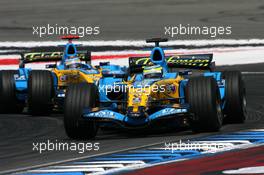 30.07.2006 Hockenheim, Germany,  Giancarlo Fisichella (ITA), Renault F1 Team R26, leads Fernando Alonso (ESP), Renault F1 Team R26 - Formula 1 World Championship, Rd 12, German Grand Prix, Sunday Race