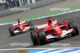 30.07.2006 Hockenheim, Germany,  Michael Schumacher (GER), Scuderia Ferrari, 248 F1 and Felipe Massa (BRA), Scuderia Ferrari, 248 F1  - Formula 1 World Championship, Rd 12, German Grand Prix, Sunday Race