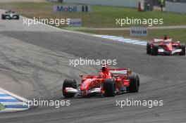 30.07.2006 Hockenheim, Germany,  Michael Schumacher (GER), Scuderia Ferrari, 248 F1, Felipe Massa (BRA), Scuderia Ferrari, 248 F1 - Formula 1 World Championship, Rd 12, German Grand Prix, Sunday Race