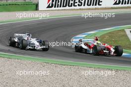 30.07.2006 Hockenheim, Germany,  Ralf Schumacher (GER), Toyota Racing,TF106 and Jacques Villeneuve (CDN), BMW Sauber F1 Team, F1.06, collided on the first lap - Formula 1 World Championship, Rd 12, German Grand Prix, Sunday Race