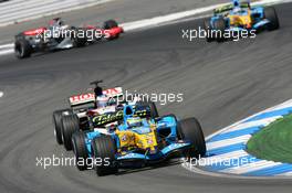 30.07.2006 Hockenheim, Germany,  Giancarlo Fisichella (ITA), Renault F1 Team, R26 and Jenson Button (GBR), Honda Racing F1 Team, RA106 - Formula 1 World Championship, Rd 12, German Grand Prix, Sunday Race