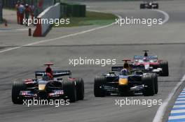30.07.2006 Hockenheim, Germany,  Vitantonio Liuzzi (ITA), Scuderia Toro Rosso, STR01 with David Coulthard (GBR), Red Bull Racing, RB2 - Formula 1 World Championship, Rd 12, German Grand Prix, Sunday Race