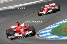30.07.2006 Hockenheim, Germany,  Michael Schumacher (GER), Scuderia Ferrari, 248 F1 and Felipe Massa (BRA), Scuderia Ferrari, 248 F1 - Formula 1 World Championship, Rd 12, German Grand Prix, Sunday Race