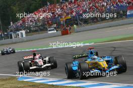 30.07.2006 Hockenheim, Germany,  Fernando Alonso (ESP), Renault F1 Team, R26 and Rubens Barrichello (BRA), Honda Racing F1 Team, RA106 and Mark Webber (AUS), Williams F1 Team, FW28 Cosworth - Formula 1 World Championship, Rd 12, German Grand Prix, Sunday Race