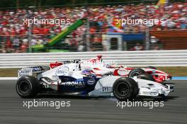 30.07.2006 Hockenheim, Germany,  Jacques Villeneuve (CDN), BMW Sauber F1 Team, F1.06 and Takuma Sato (JPN), Super Aguri F1, SA06  - Formula 1 World Championship, Rd 12, German Grand Prix, Sunday Race