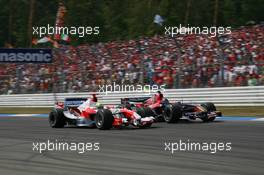 30.07.2006 Hockenheim, Germany,  Ralf Schumacher (GER), Toyota Racing, TF106 and Scott Speed (USA), Scuderia Toro Rosso, STR01 - Formula 1 World Championship, Rd 12, German Grand Prix, Sunday Race
