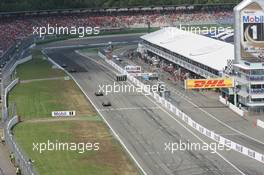 30.07.2006 Hockenheim, Germany,  Tiago Monteiro (POR), Midland MF1 Racing, Toyota M16 and Christijan Albers (NED), Midland MF1 Racing, Toyota M16  - Formula 1 World Championship, Rd 12, German Grand Prix, Sunday Race