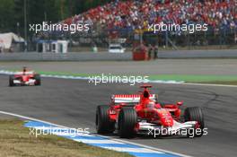 30.07.2006 Hockenheim, Germany,  Michael Schumacher (GER), Scuderia Ferrari, 248 F1 and Felipe Massa (BRA), Scuderia Ferrari, F2006 - Formula 1 World Championship, Rd 12, German Grand Prix, Sunday Race