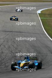 30.07.2006 Hockenheim, Germany,  Giancarlo Fisichella (ITA), Renault F1 Team R26, leads Fernando Alonso (ESP), Renault F1 Team R26 - Formula 1 World Championship, Rd 12, German Grand Prix, Sunday Race
