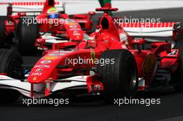 30.07.2006 Hockenheim, Germany,  Michael Schumacher (GER), Scuderia Ferrari 248 F1 (1st, front) and Felipe Massa (BRA), Scuderia Ferrari 248 F1 (2nd, rear) - Formula 1 World Championship, Rd 12, German Grand Prix, Sunday Race