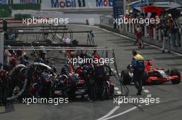 30.07.2006 Hockenheim, Germany,  Scott Speed (USA), Scuderia Toro Rosso, STR01 pit stop - Formula 1 World Championship, Rd 12, German Grand Prix, Sunday Race