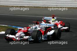 30.07.2006 Hockenheim, Germany,  Jarno Trulli (ITA), Toyota Racing TF106, leads Ralf Schumacher (GER), Toyota Racing TF106 - Formula 1 World Championship, Rd 12, German Grand Prix, Sunday Race