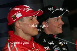 29.07.2006 Hockenheim, Germany,  Michael Schumacher (GER), Scuderia Ferrari  and Kimi Raikkonen (FIN), Räikkönen, McLaren Mercedes - Formula 1 World Championship, Rd 12, German Grand Prix, Saturday Press Conference