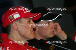 29.07.2006 Hockenheim, Germany,  Michael Schumacher (GER), Scuderia Ferrari  and Kimi Raikkonen (FIN), Räikkönen, McLaren Mercedes - Formula 1 World Championship, Rd 12, German Grand Prix, Saturday Press Conference