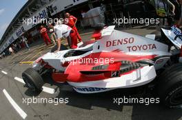 29.07.2006 Hockenheim, Germany,  Car of Jarno Trulli (ITA), Toyota Racing after putting out the fire - gets pushed back to the garage - Formula 1 World Championship, Rd 12, German Grand Prix, Saturday Practice