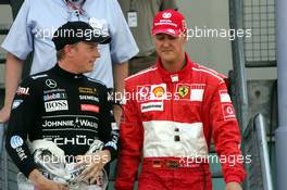 29.07.2006 Hockenheim, Germany,  Kimi Raikkonen (FIN), Räikkönen, McLaren Mercedes and Michael Schumacher (GER), Scuderia Ferrari - Formula 1 World Championship, Rd 12, German Grand Prix, Saturday Qualifying