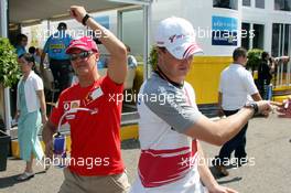 30.07.2006 Hockenheim, Germany,  Michael Schumacher (GER), Scuderia Ferrari and Ralf Schumacher (GER), Toyota Racing - Formula 1 World Championship, Rd 12, German Grand Prix, Sunday