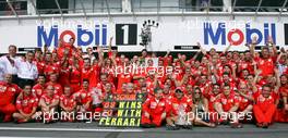 30.07.2006 Hockenheim, Germany,  Ferrari team celebration- Formula 1 World Championship, Rd 12, German Grand Prix, Sunday