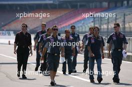 27.07.2006 Hockenheim, Germany,  Markus Winkelhock (GER), Test Driver, Midland MF1 Racing and Midland MF1 Racing team personnel go to walk a lap of the circuit - Formula 1 World Championship, Rd 12, German Grand Prix, Thursday