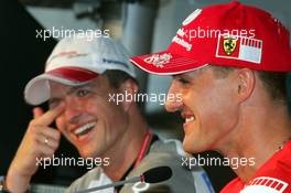 27.07.2006 Hockenheim, Germany,  (L-R) Ralf Schumacher (GER), Toyota Racing and Michael Schumacher (GER), Scuderia Ferrari - Formula 1 World Championship, Rd 12, German Grand Prix, Thursday Press Conference