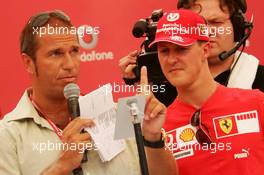 27.07.2006 Heidelberg, Germany,  Kai Ebel (GER), RTL Television, with Michael Schumacher (GER), Scuderia Ferrari - Vodafone Racing DJ's Event - Formula 1 World Championship, Rd 12, German Grand Prix, Thursday