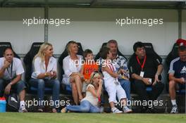 26.07.2006 Mannheim, Germany,  "Spiel des Herzens" - Corina Schumacher (GER), Corinna, Wife of Michael Schumacher is watching the game on the field and Willi Weber (GER), Driver Manager - Michael Schumacher (GER), Scuderia Ferrari - F1 Superstars (Michael Schumacher) plays against the RTL-Superstars, Charity, RTL Stiftung "Kinder in Not", UNESCO - Formula 1 World Championship, Rd 12, German Grand Prix, Wednesday