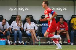 26.07.2006 Mannheim, Germany,  "Spiel des Herzens" - Corina Schumacher (GER), Corinna, Wife of Michael Schumacher is watching teh game on the field- Michael Schumacher (GER), Scuderia Ferrari - F1 Superstars (Michael Schumacher) plays against the RTL-Superstars, Charity, RTL Stiftung "Kinder in Not", UNESCO - Formula 1 World Championship, Rd 12, German Grand Prix, Wednesday