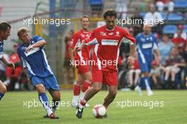 26.07.2006 Mannheim, Germany,  "Spiel des Herzens" - Maurizio Gaudino - F1 Superstars (Michael Schumacher) plays against the RTL-Superstars, Charity, RTL Stiftung "Kinder in Not", UNESCO - Formula 1 World Championship, Rd 12, German Grand Prix, Wednesday