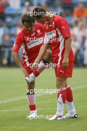 26.07.2006 Mannheim, Germany,  "Spiel des Herzens" - Felipe Massa (BRA), Scuderia Ferrari and Michael Schumacher (GER), Scuderia Ferrari - F1 Superstars (Michael Schumacher) plays against the RTL-Superstars, Charity, RTL Stiftung "Kinder in Not", UNESCO - Formula 1 World Championship, Rd 12, German Grand Prix, Wednesday