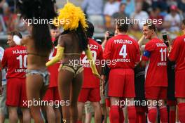 26.07.2006 Mannheim, Germany,  "Spiel des Herzens" - Michael Schumacher (GER), Scuderia Ferrari watches the entertainment before the match - F1 Superstars (Michael Schumacher) plays against the RTL-Superstars, Charity, RTL Stiftung "Kinder in Not", UNESCO - Formula 1 World Championship, Rd 12, German Grand Prix, Wednesday