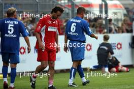 26.07.2006 Mannheim, Germany,  "Spiel des Herzens" - Mauritio Gaudino and Till Schweiger - F1 Superstars (Michael Schumacher) plays against the RTL-Superstars, Charity, RTL Stiftung "Kinder in Not", UNESCO - Formula 1 World Championship, Rd 12, German Grand Prix, Wednesday