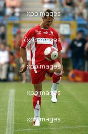 26.07.2006 Mannheim, Germany,  "Spiel des Herzens" - Michael Schumacher (GER), Scuderia Ferrari - F1 Superstars (Michael Schumacher) plays against the RTL-Superstars, Charity, RTL Stiftung "Kinder in Not", UNESCO - Formula 1 World Championship, Rd 12, German Grand Prix, Wednesday