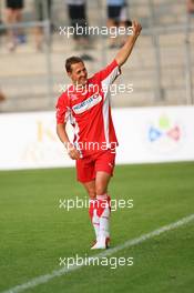 26.07.2006 Mannheim, Germany,  "Spiel des Herzens" - Michael Schumacher (GER), Scuderia Ferrari waves to the crowd - F1 Superstars (Michael Schumacher) plays against the RTL-Superstars, Charity, RTL Stiftung "Kinder in Not", UNESCO - Formula 1 World Championship, Rd 12, German Grand Prix, Wednesday