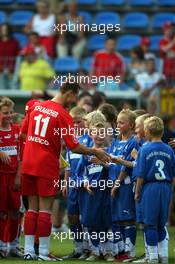 26.07.2006 Mannheim, Germany,  "Spiel des Herzens" - Michael Schumacher (GER), Scuderia Ferrari - F1 Superstars (Michael Schumacher) plays against the RTL-Superstars, Charity, RTL Stiftung "Kinder in Not", UNESCO - Formula 1 World Championship, Rd 12, German Grand Prix, Wednesday