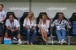 26.07.2006 Mannheim, Germany,  "Spiel des Herzens" - Corina Schumacher (GER), Corinna, Wife of Michael Schumacher is watching the game on the field, Willi Weber (GER), Driver Manager - Michael Schumacher (GER), Scuderia Ferrari - F1 Superstars (Michael Schumacher) plays against the RTL-Superstars, Charity, RTL Stiftung "Kinder in Not", UNESCO - Formula 1 World Championship, Rd 12, German Grand Prix, Wednesday