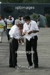 08.09.2006 Monza, Italy,  Bernie Ecclestone (GBR) and Pasquale Lattuneddu (FRA), FIA  - Formula 1 World Championship, Rd 15, Italian Grand Prix, Friday