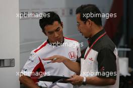 08.09.2006 Monza, Italy,  Takuma Sato (JPN), Super Aguri F1 talking with a Honda engeneer - Formula 1 World Championship, Rd 15, Italian Grand Prix, Friday Practice