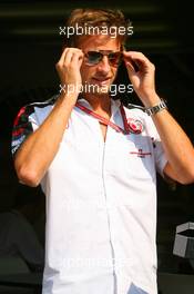 08.09.2006 Monza, Italy,  Jenson Button (GBR), Honda Racing F1 Team is presented with a 24ct Gold pair of his favourite "Aviator" Ray-Ban sunglasses - Formula 1 World Championship, Rd 15, Italian Grand Prix, Friday