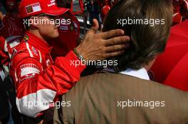 10.09.2006 Monza, Italy,  Michael Schumacher (GER), Scuderia Ferrari and Luca di Montezemolo (ITA), Scuderia Ferrari, Fiat President, Chairman & Managing Director - Formula 1 World Championship, Rd 15, Italian Grand Prix, Sunday Pre-Race Grid