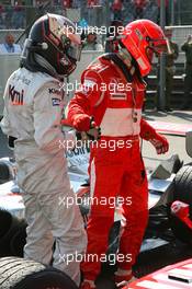 10.09.2006 Monza, Italy,  Kimi Raikkonen (FIN), Räikkönen, McLaren Mercedes, Michael Schumacher (GER), Scuderia Ferrari - Formula 1 World Championship, Rd 15, Italian Grand Prix, Sunday Podium