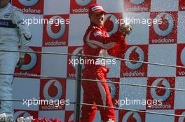 10.09.2006 Monza, Italy,  Winner, Michael Schumacher (GER), Scuderia Ferrari, 248 F1, 2nd Kimi Raikkonen (FIN), Räikkönen, McLaren Mercedes, MP4-21, 3rd, Robert Kubica (POL), BMW Sauber F1 Team, F1.06 - Formula 1 World Championship, Rd 15, Italian Grand Prix, Sunday Podium