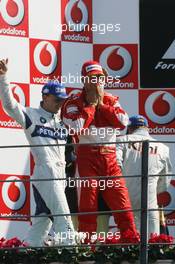 10.09.2006 Monza, Italy,  Winner, Michael Schumacher (GER), Scuderia Ferrari, 248 F1, 2nd Kimi Raikkonen (FIN), Räikkönen, McLaren Mercedes, MP4-21, 3rd, Robert Kubica (POL), BMW Sauber F1 Team, F1.06 - Formula 1 World Championship, Rd 15, Italian Grand Prix, Sunday Podium