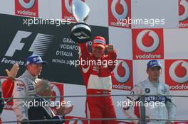 10.09.2006 Monza, Italy,  Winner, Michael Schumacher (GER), Scuderia Ferrari, 2nd Kimi Raikkonen (FIN), Räikkönen, McLaren Mercedes, 3rd Robert Kubica (POL),  BMW Sauber F1 Team - Formula 1 World Championship, Rd 15, Italian Grand Prix, Sunday Podium