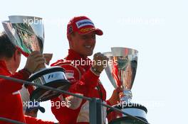 10.09.2006 Monza, Italy,  Michael Schumacher (GER), Scuderia Ferrari and Jean Todt (FRA), Scuderia Ferrari, Teamchief, General Manager, Team Principal - Formula 1 World Championship, Rd 15, Italian Grand Prix, Sunday Podium