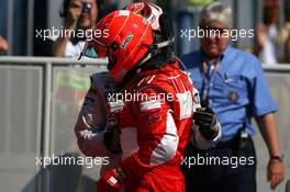 10.09.2006 Monza, Italy,  Michael Schumacher (GER), Scuderia Ferrari, Kimi Raikkonen (FIN), Räikkönen, McLaren Mercedes, MP4-21 - Formula 1 World Championship, Rd 15, Italian Grand Prix, Sunday Podium