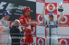 10.09.2006 Monza, Italy,  1st, Michael Schumacher (GER), Scuderia Ferrari, 2nd, Kimi Raikkonen (FIN), Räikkönen, McLaren Mercedes, 3rd, Robert Kubica (POL), BMW Sauber F1 Team - Formula 1 World Championship, Rd 15, Italian Grand Prix, Sunday Podium